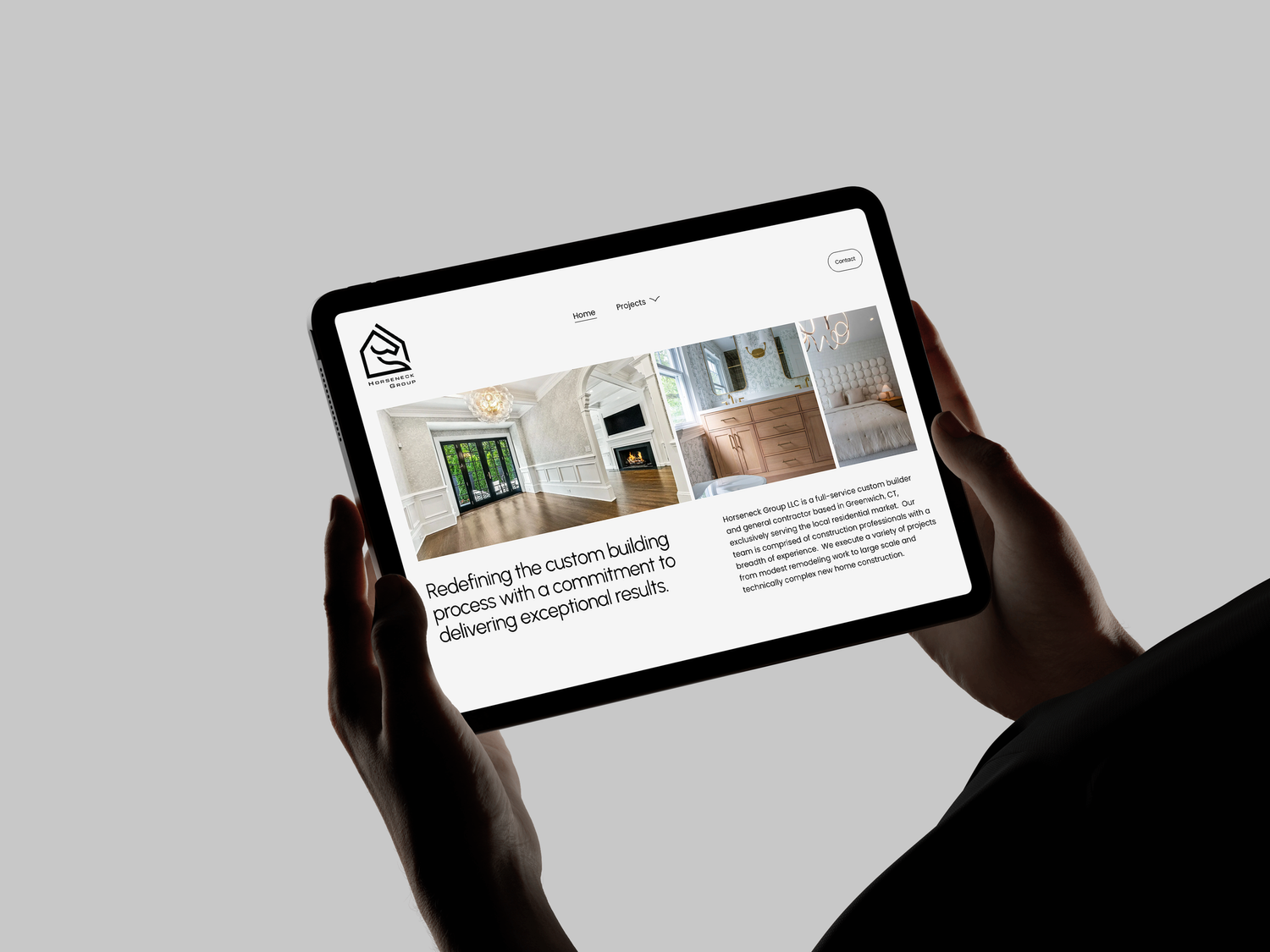 The Horseneck Group site shown on a laptop and phone