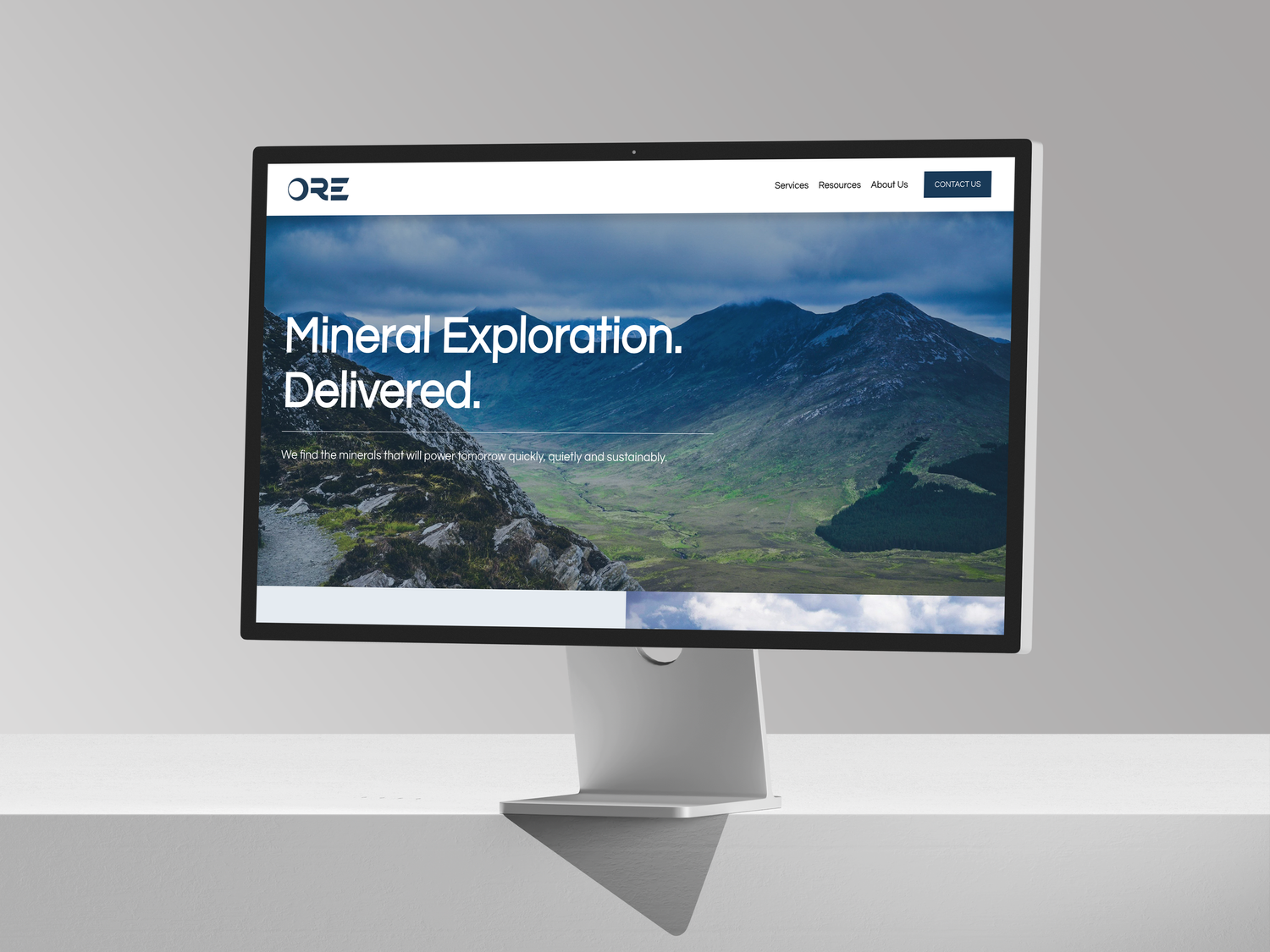The ORE site laid out across desktop and mobile screens